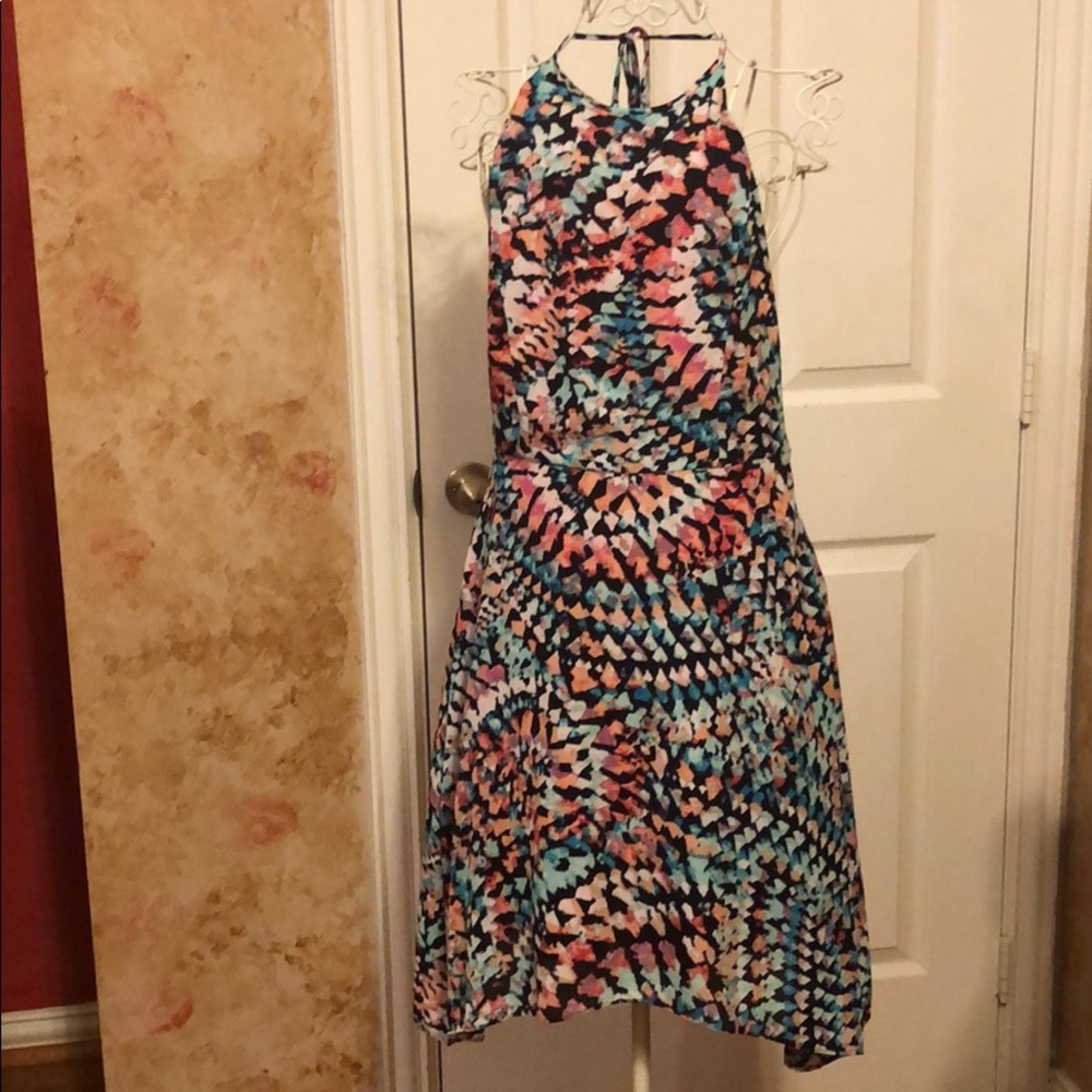 Asymmetrical halter dress with vibrant pattern